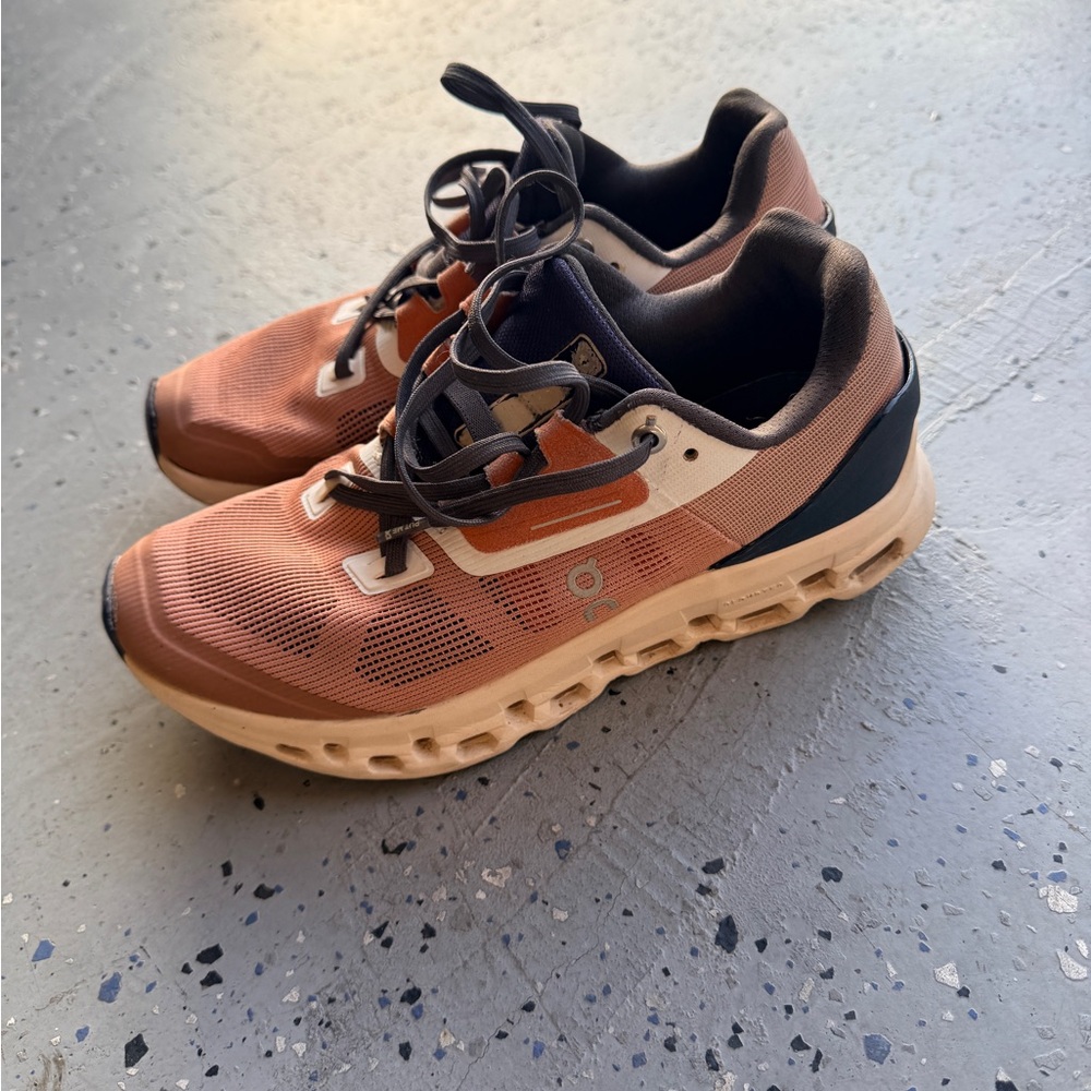 On Running Brown and Tan Athletic Shoes